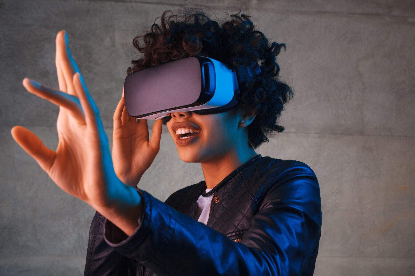 an image showing a young woman with VR glasses