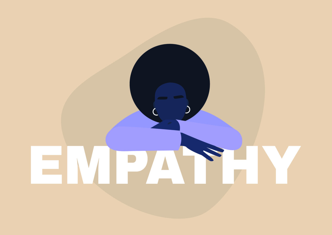 an image showing a black person and a word empathy. 