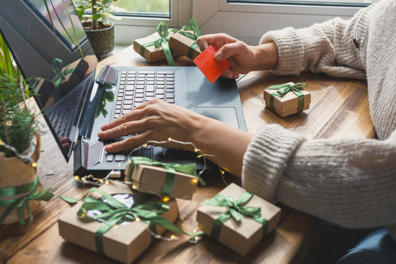 an image showing a person doing a Christmas shopping for 2022