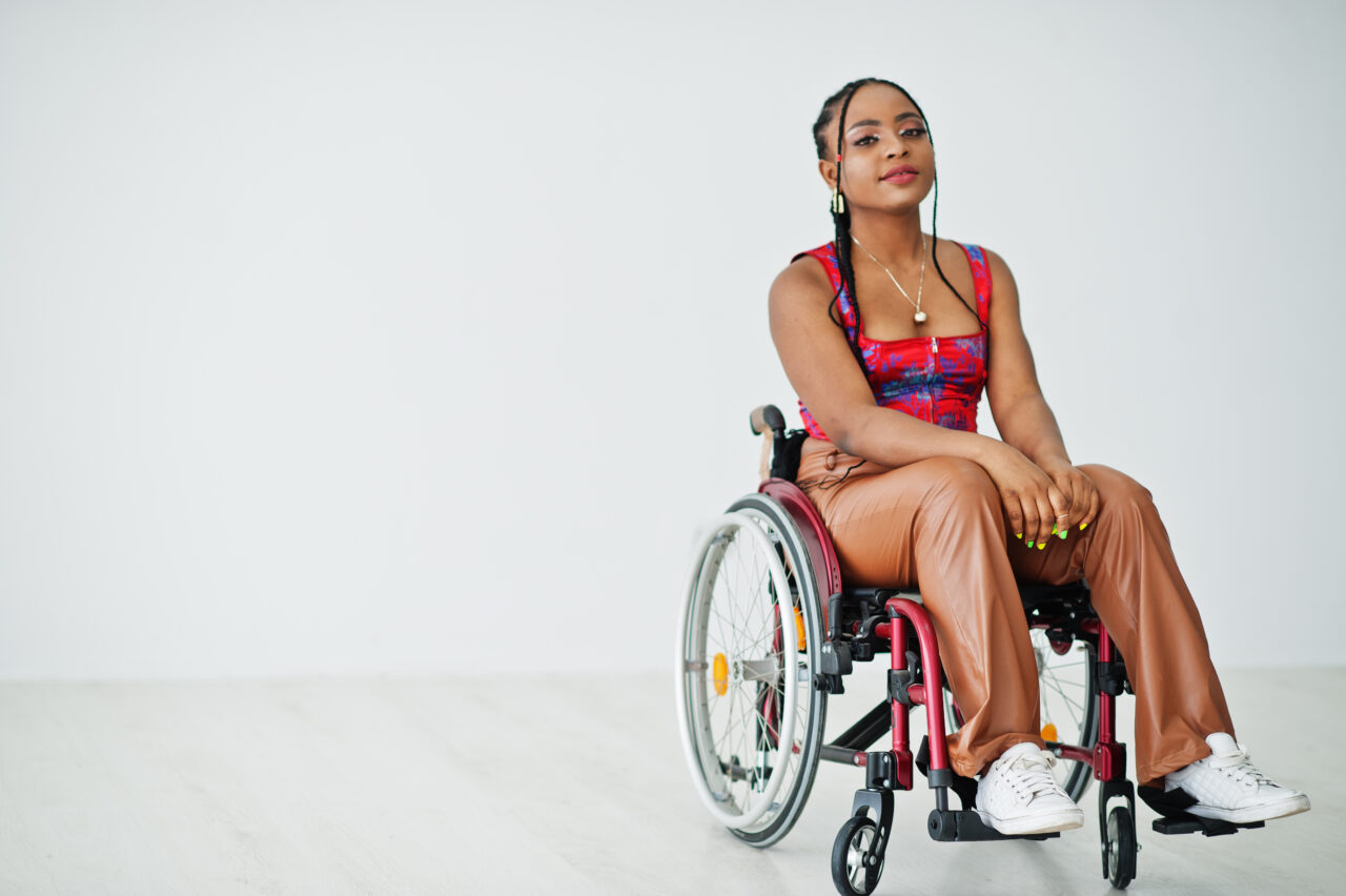 An image showing young black women the wheelchair. 